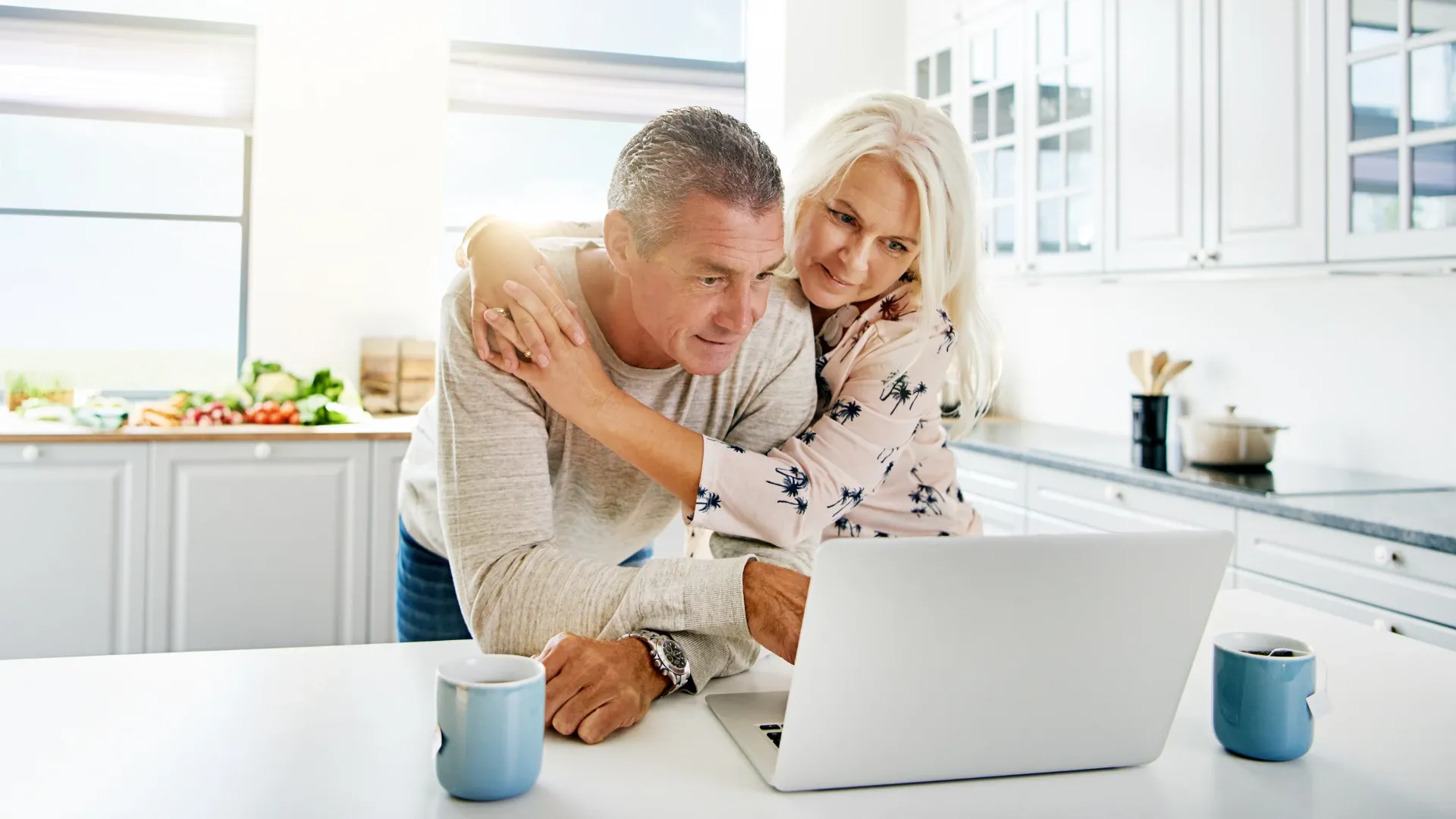 Senior couple using a virtual tour to help make a housing decision