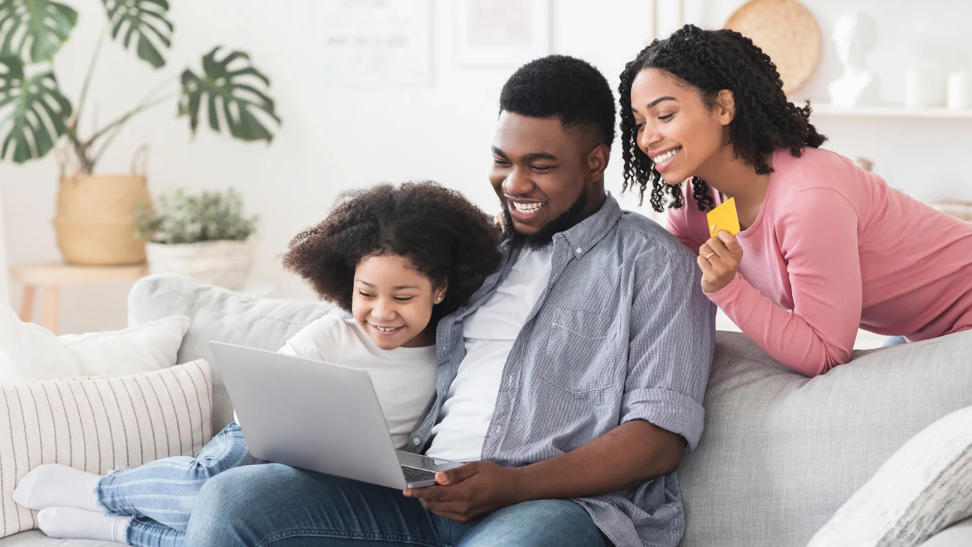 Happy family exploring a resort via virtual tour before booking their trip